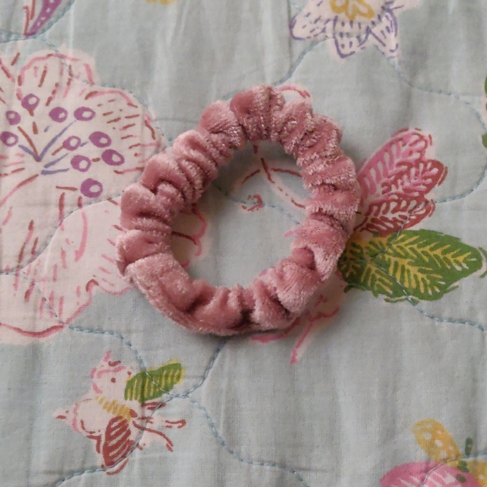 Super cute little furry light pink scrunchie